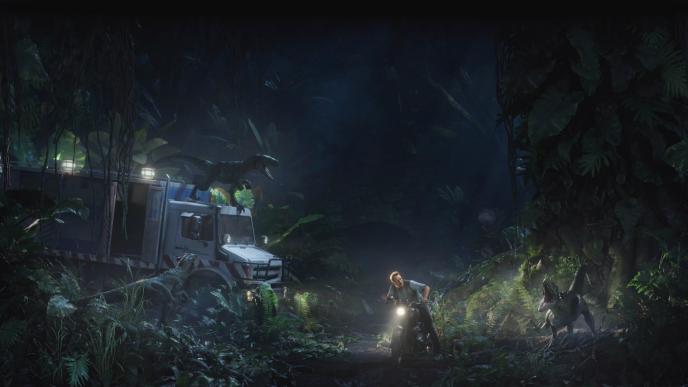 Chris Pratt in Jurassic World in the jungle at night next to a velosiraptor
